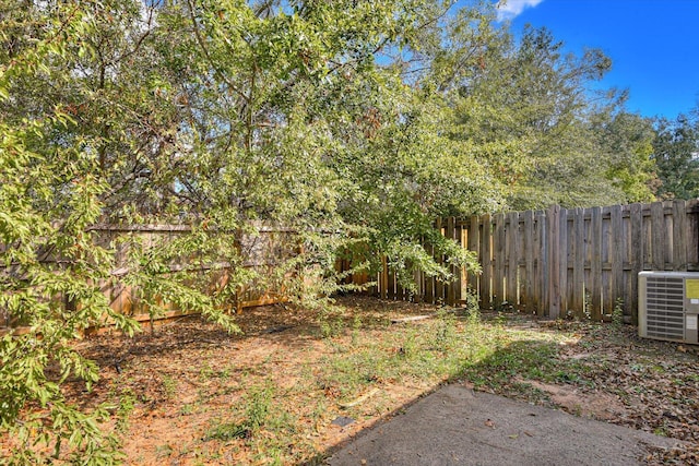 view of yard featuring central AC