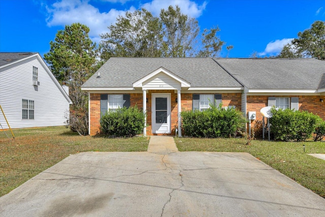 view of front of home with a front lawn