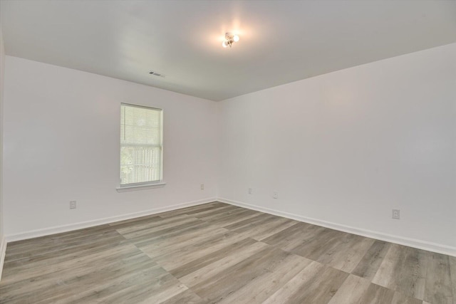 empty room featuring light hardwood / wood-style floors