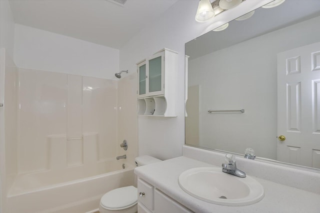 full bathroom featuring vanity, tub / shower combination, and toilet