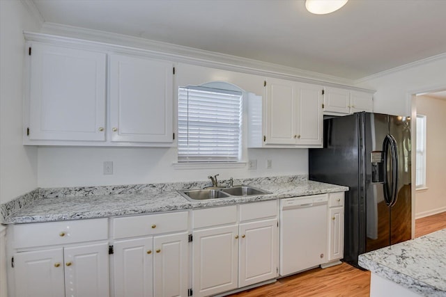 kitchen with sink, white dishwasher, black fridge with ice dispenser, white cabinets, and ornamental molding