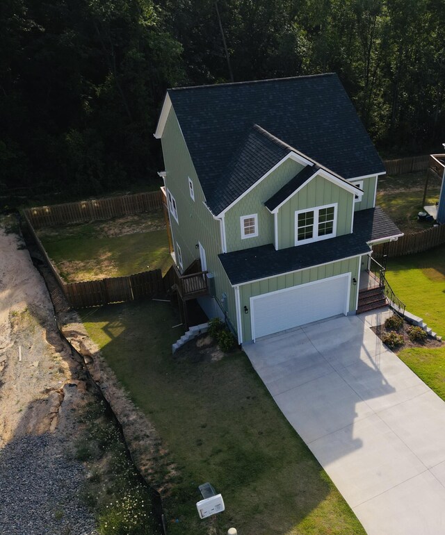 252 Mossy Oak Cir, North Augusta, SC 29841 - view of front of home with board and batten siding, concrete driveway, and a garage