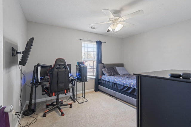 carpeted bedroom with ceiling fan