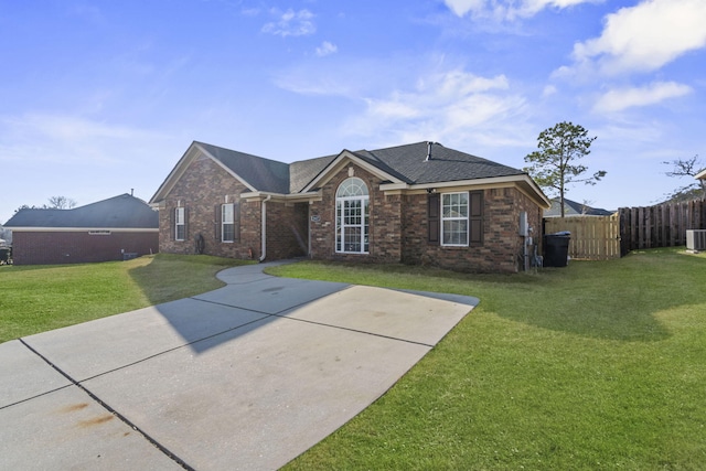 ranch-style house with central AC unit, a front yard, and a patio