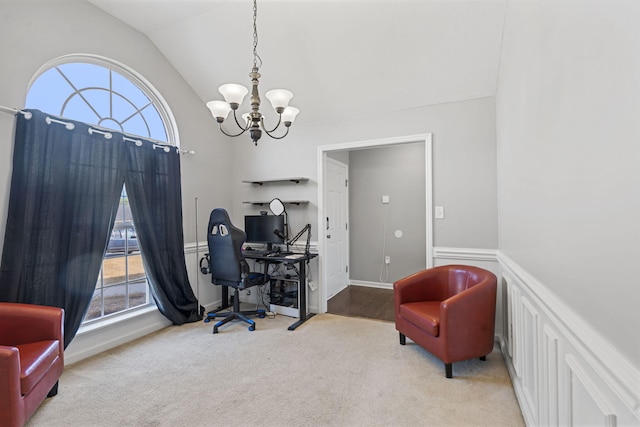 carpeted office space with lofted ceiling and an inviting chandelier