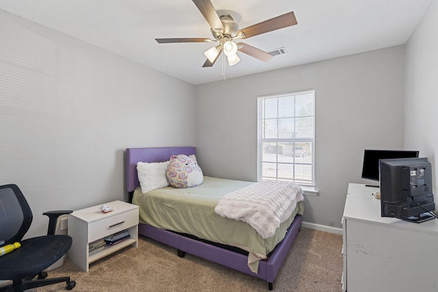 carpeted bedroom with ceiling fan