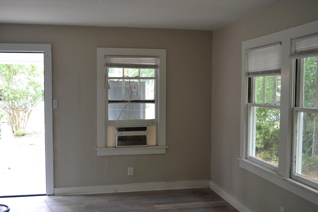 1919 Warren St, Augusta, GA 30904 - doorway to outside with healthy amount of natural light, wood finished floors, baseboards, and cooling unit