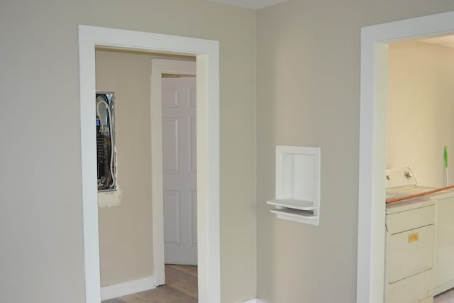 1919 Warren St, Augusta, GA 30904 - corridor featuring washer / clothes dryer and baseboards