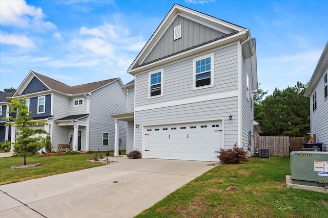 1404 Feldspar Ct, Augusta, GA 30909 - view of front of property with board and batten siding, a garage, and concrete driveway