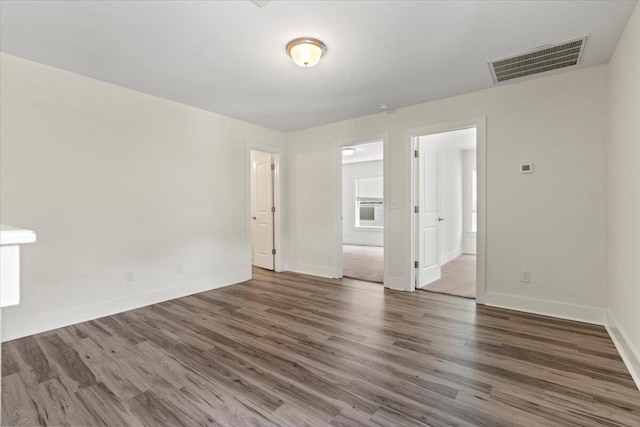 1404 Feldspar Ct, Augusta, GA 30909 - empty room featuring wood finished floors and baseboards