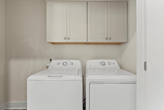 1404 Feldspar Ct, Augusta, GA 30909 - laundry area featuring washer and dryer and cabinet space
