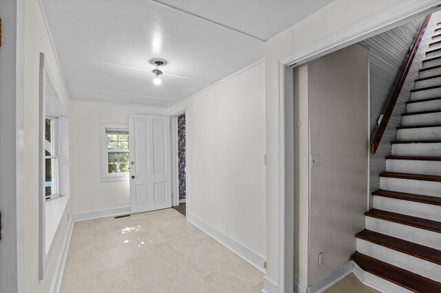 223 E Robert Toombs Ave, Washington, GA 30673 - entrance foyer featuring stairs, baseboards, and light tile patterned flooring