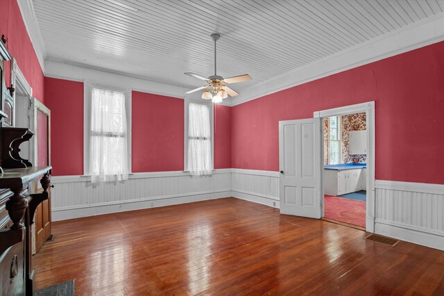 223 E Robert Toombs Ave, Washington, GA 30673 - empty room with a wainscoted wall, ceiling fan, wood-type flooring, and ornamental molding