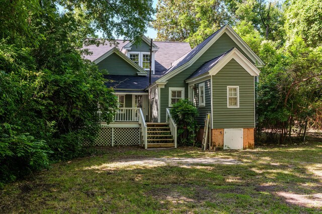 223 E Robert Toombs Ave, Washington, GA 30673 - rear view of house featuring stairway, a yard, a deck, and roof with shingles