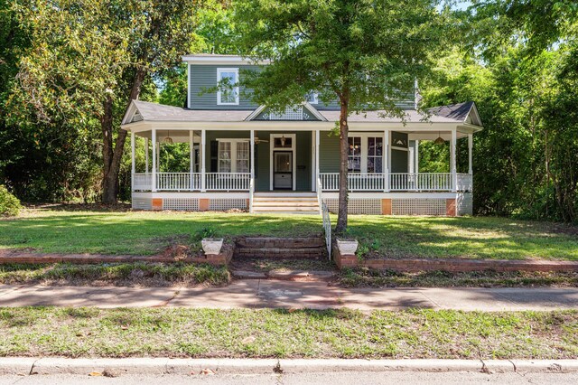 223 E Robert Toombs Ave, Washington, GA 30673 - view of front facade with a front yard, a porch, and french doors