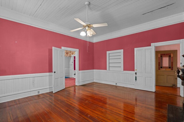 223 E Robert Toombs Ave, Washington, GA 30673 - unfurnished room with ceiling fan, hardwood / wood-style floors, wainscoting, and crown molding