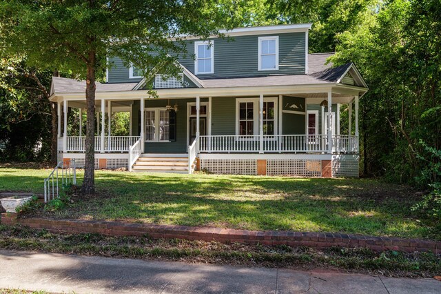 223 E Robert Toombs Ave, Washington, GA 30673 - country-style home featuring a porch, a front lawn, and a shingled roof