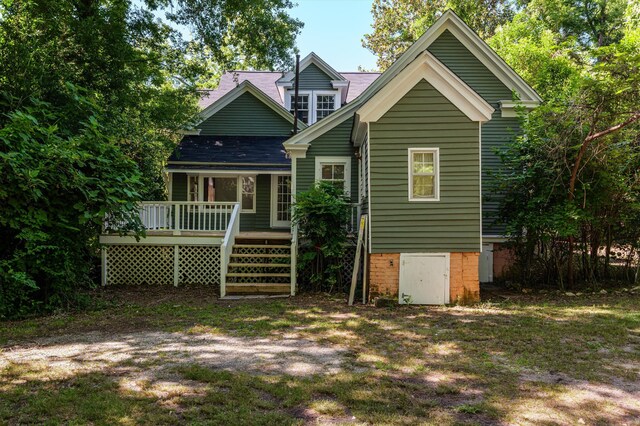 223 E Robert Toombs Ave, Washington, GA 30673 - rear view of property with a wooden deck