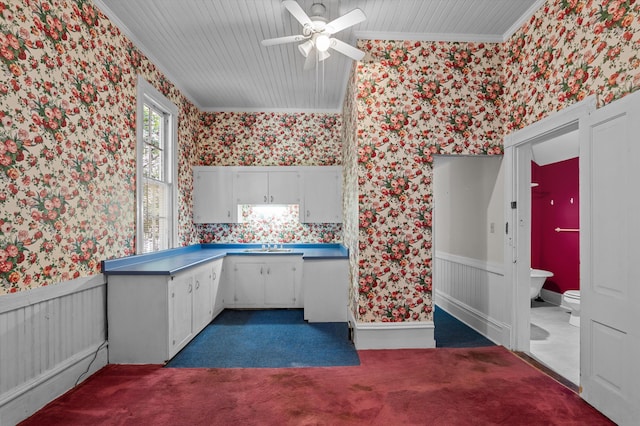 223 E Robert Toombs Ave, Washington, GA 30673 - unfurnished office featuring wallpapered walls, crown molding, ceiling fan, dark carpet, and a sink