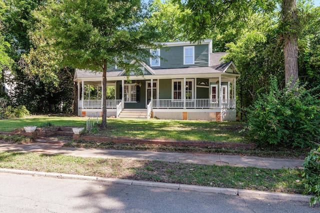223 E Robert Toombs Ave, Washington, GA 30673 - view of front of home with covered porch and a front lawn