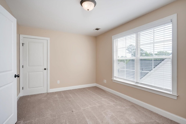1102 Highmoor Ln, Evans, GA 30809 - spare room with light colored carpet and baseboards