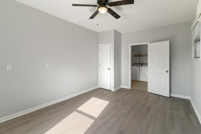 3413 Sutton Pl, Augusta, GA 30906 - unfurnished bedroom with washing machine and dryer, wood finished floors, and baseboards