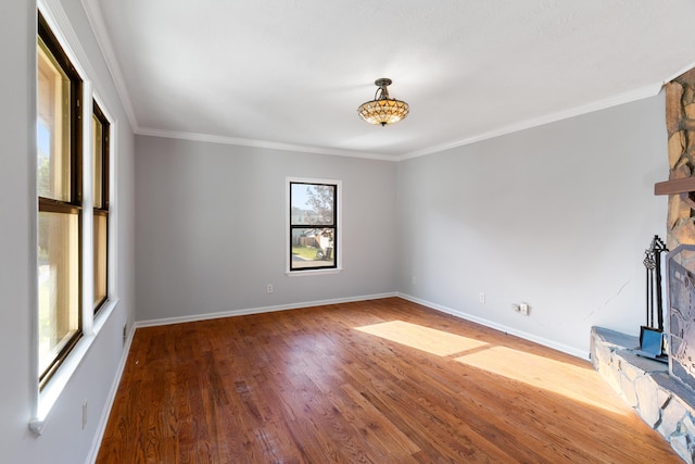3413 Sutton Pl, Augusta, GA 30906 - unfurnished living room featuring baseboards, ornamental molding, and wood finished floors