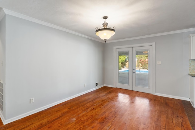 3413 Sutton Pl, Augusta, GA 30906 - spare room featuring wood finished floors, baseboards, ornamental molding, and french doors