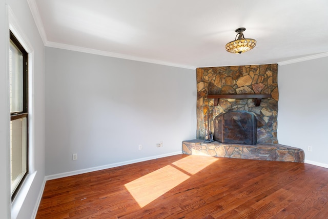 3413 Sutton Pl, Augusta, GA 30906 - unfurnished living room featuring a stone fireplace, baseboards, ornamental molding, and wood finished floors