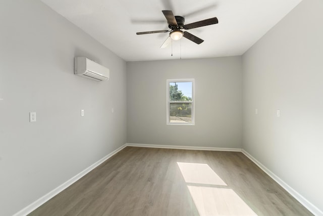 3413 Sutton Pl, Augusta, GA 30906 - empty room featuring ceiling fan, baseboards, light wood-type flooring, and a wall unit AC