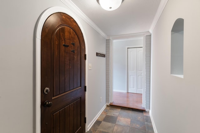 3413 Sutton Pl, Augusta, GA 30906 - entrance foyer with arched walkways, stone finish flooring, baseboards, and ornamental molding