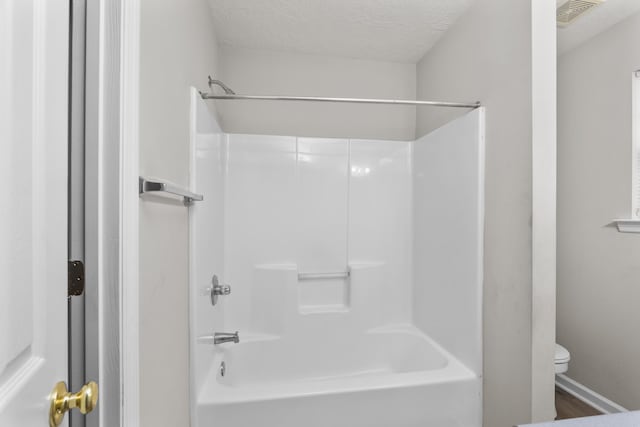 159 Redbud Dr, North Augusta, SC 29841 - bathroom with shower / bathtub combination and a textured ceiling