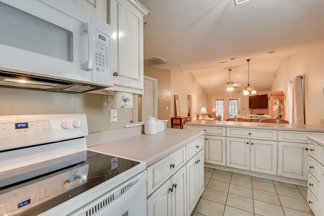8030 Reagan Cir, Augusta, GA 30909 - kitchen with white appliances, light tile patterned floors, open floor plan, vaulted ceiling, and light countertops