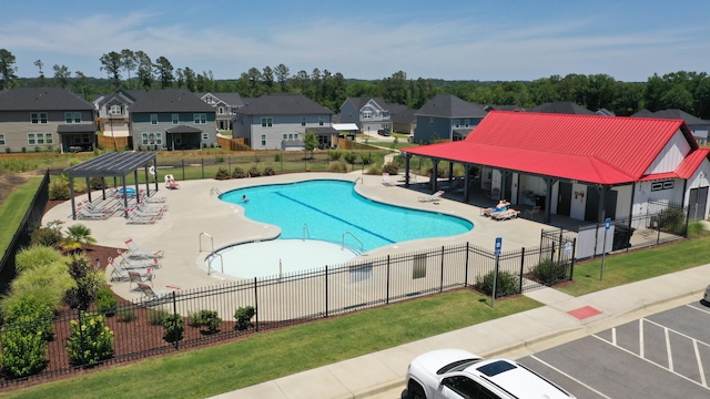 view of swimming pool featuring a patio