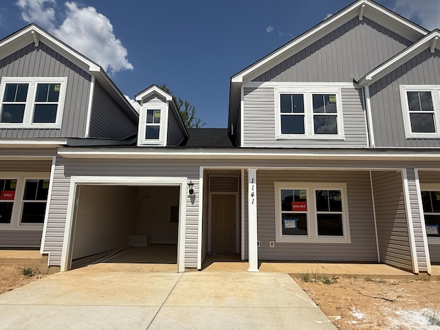1141 Clareton Dr, Grovetown, GA 30813 - view of front of house featuring driveway, a porch, and an attached garage