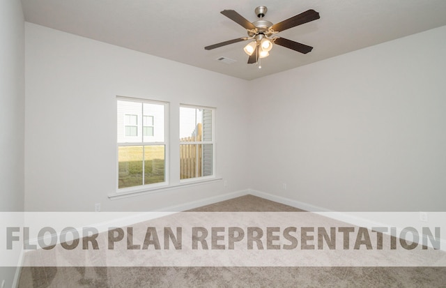 spare room featuring light colored carpet and ceiling fan