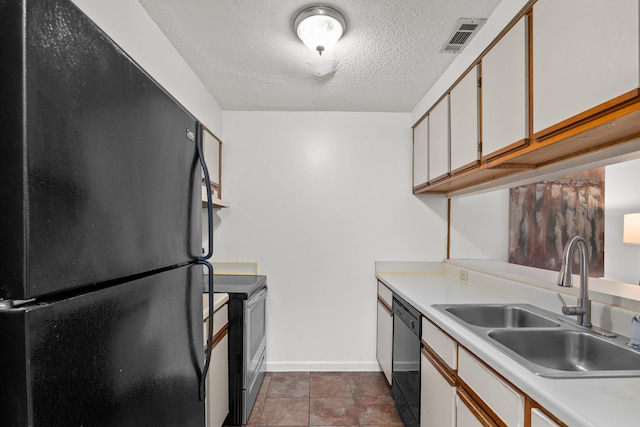 kitchen with a textured ceiling, sink, white cabinetry, and black appliances