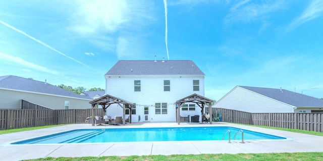 view of swimming pool featuring a gazebo, a fenced backyard, and a patio