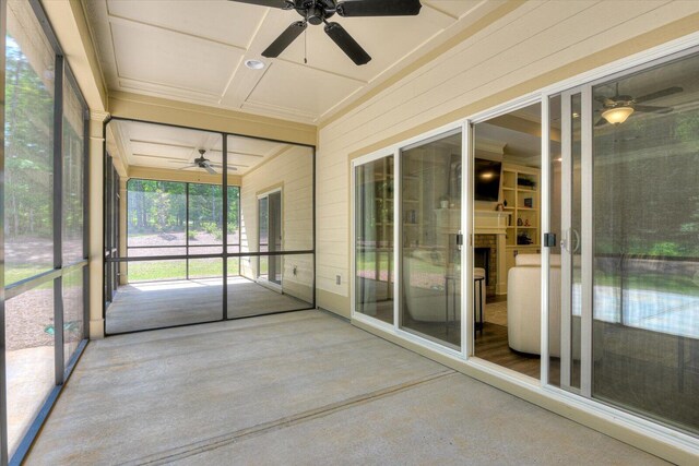 unfurnished sunroom featuring coffered ceiling