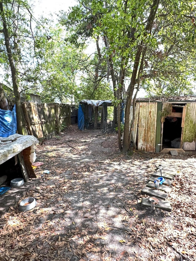 3216 Alpine Rd, Augusta, GA 30909 - view of yard with fence and an outbuilding