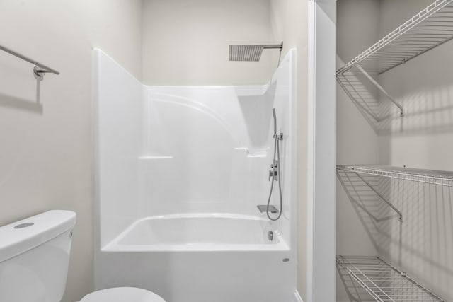 bathroom with  shower combination and toilet