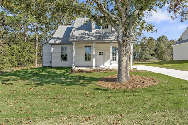 cape cod home with a porch and a front yard