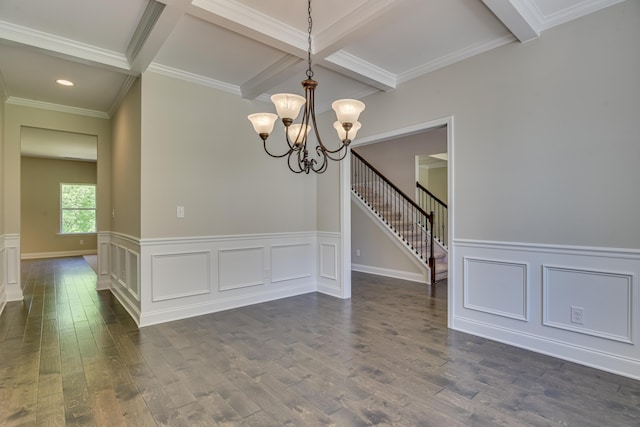 unfurnished dining area featuring beam ceiling, dark hardwood / wood-style floors, ornamental molding, and a notable chandelier