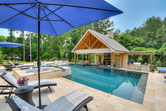 612 Emerald Xing, Evans, GA 30809 - swimming pool featuring an outdoor kitchen, a patio, and an in-ground hot tub