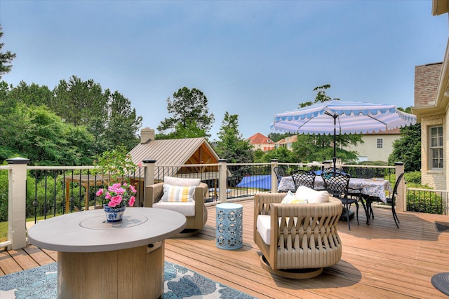 612 Emerald Xing, Evans, GA 30809 - wooden terrace with outdoor dining space