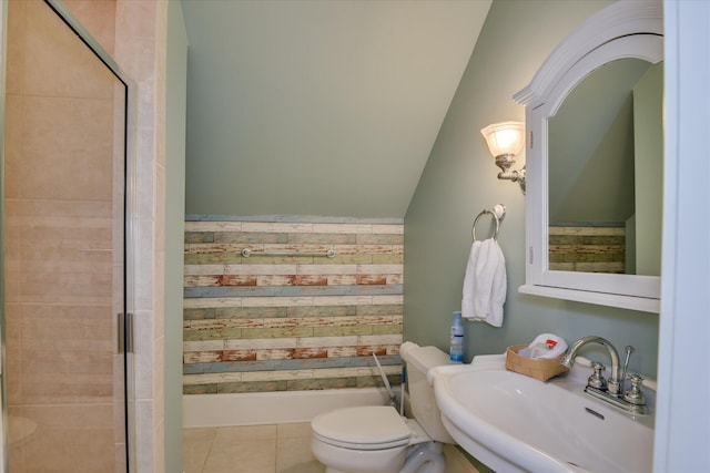 612 Emerald Xing, Evans, GA 30809 - bathroom with a shower stall, vaulted ceiling, and tile patterned flooring