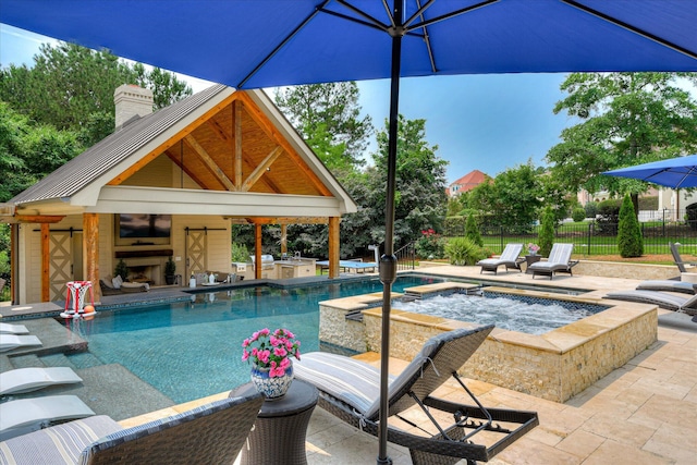 612 Emerald Xing, Evans, GA 30809 - view of swimming pool featuring an in-ground hot tub, a large fireplace, and a patio
