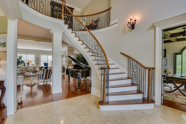 612 Emerald Xing, Evans, GA 30809 - stairway featuring ornamental molding, ornate columns, and a towering ceiling