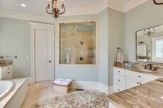 612 Emerald Xing, Evans, GA 30809 - full bathroom with vanity, a walk in shower, a chandelier, a garden tub, and ornamental molding