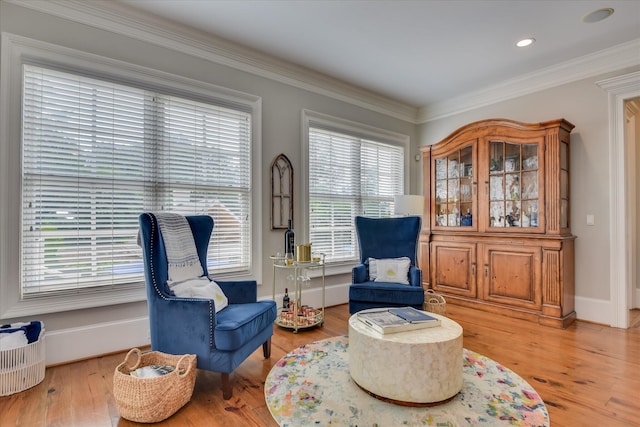 612 Emerald Xing, Evans, GA 30809 - living area with light wood-type flooring, ornamental molding, and recessed lighting